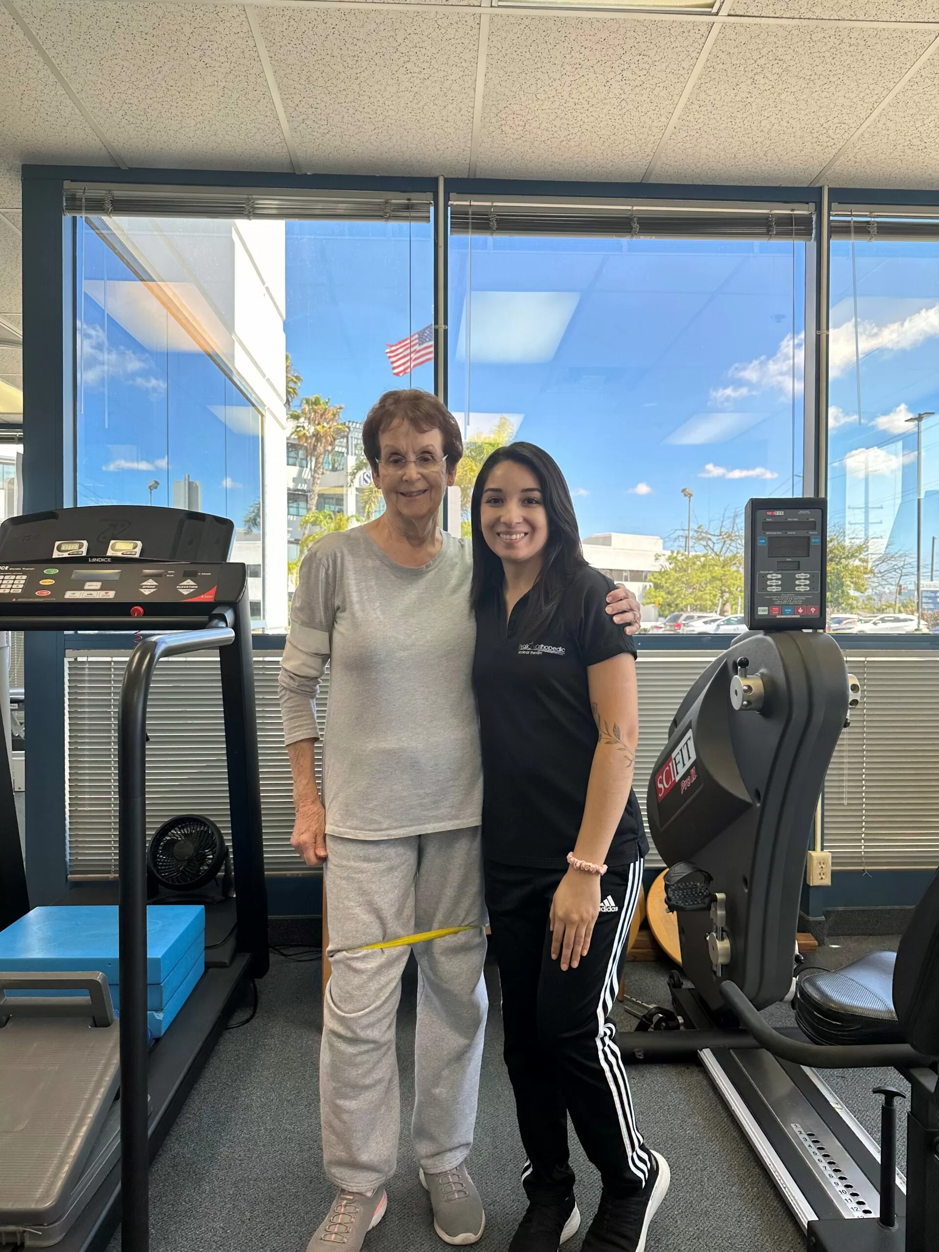 Success photo of testifier standing proud.